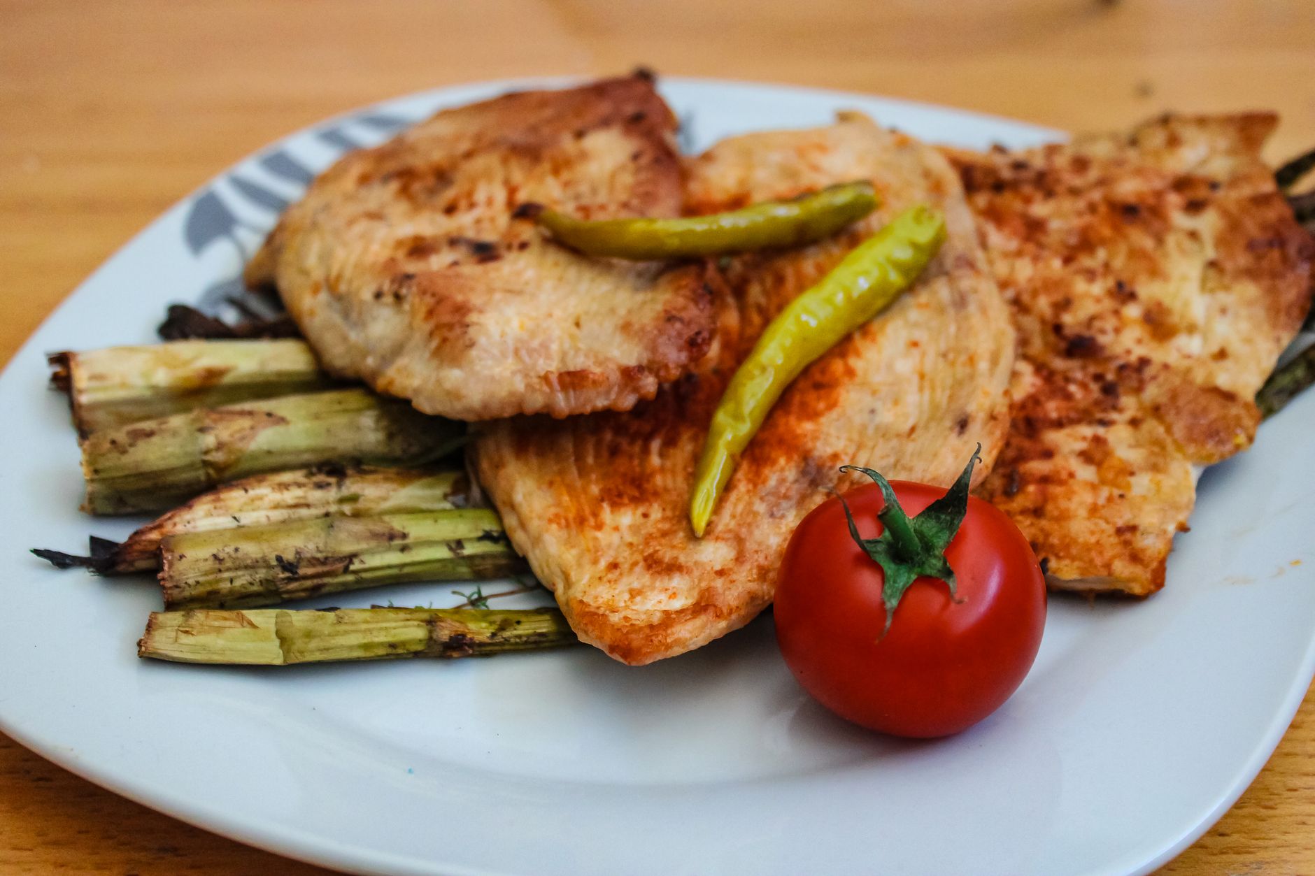 Grilled chicken with asparagus and tomato — a protein-first GLP-1 plate